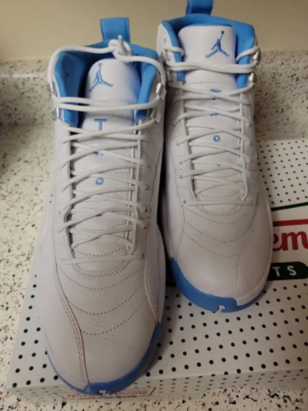 Jordan 12 Retro Melo UNC Men's High-Top Sneakers